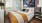 a bedroom with a large bed