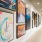 a hallway with art on the wall