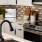 a kitchen with white cabinets