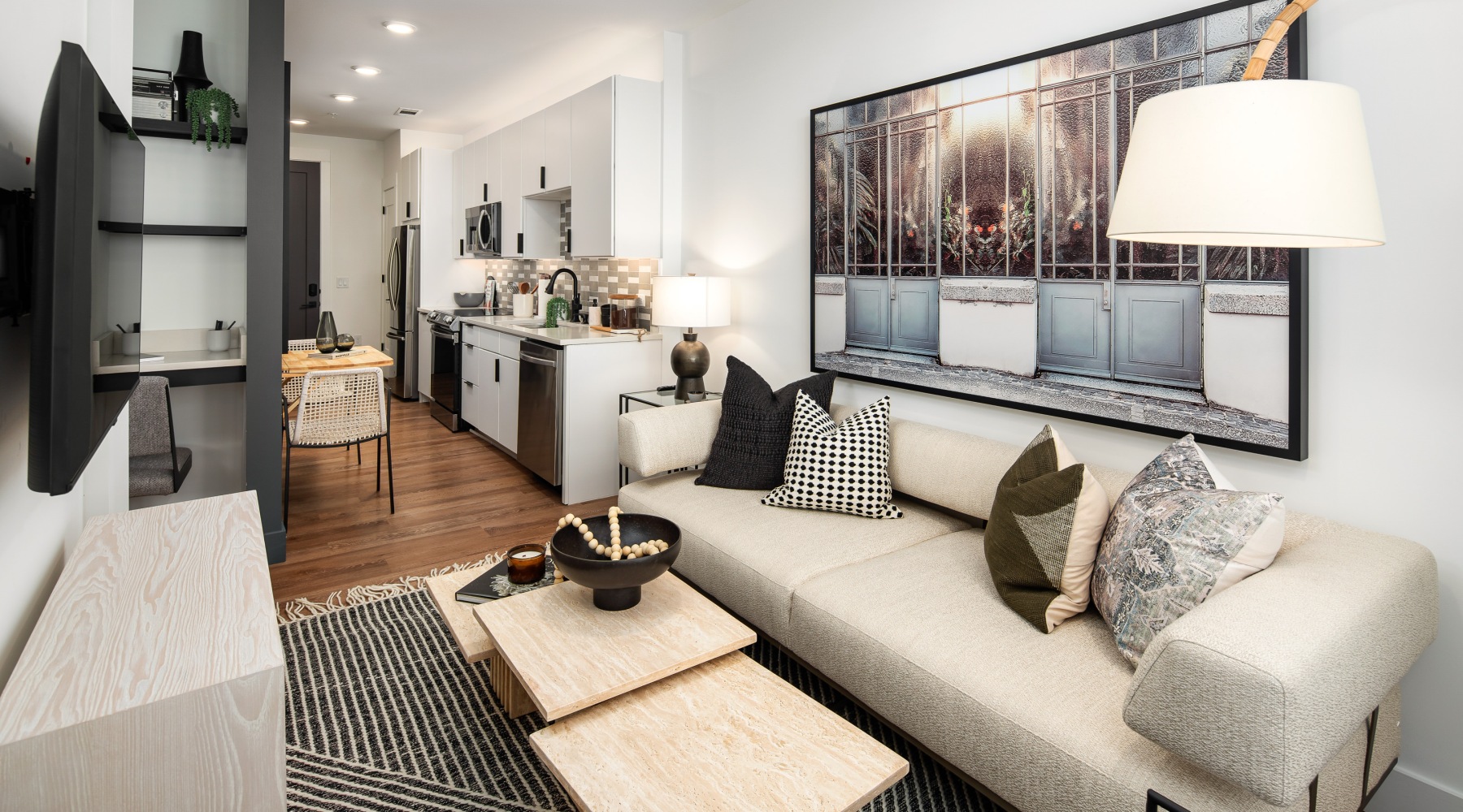 Apartment living room with modern furnishings at NOVEL Edgehill in Nashville, TN.