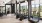 a room with treadmills facing large windows