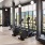 a room with treadmills facing large windows