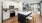a kitchen with white cabinets